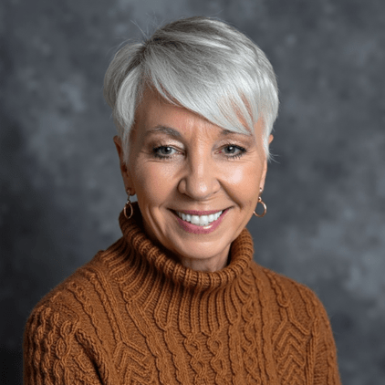 Tammy Dahl author portrait with a warm smiling expression in a professional headshot featuring a light gray background.